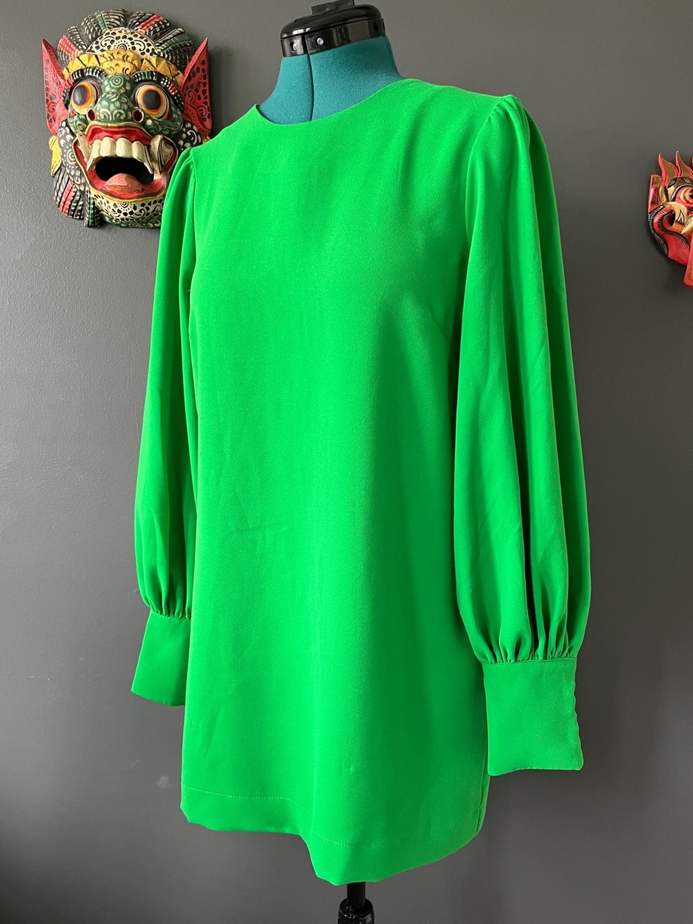 Bright green mini dress with bishop sleeves